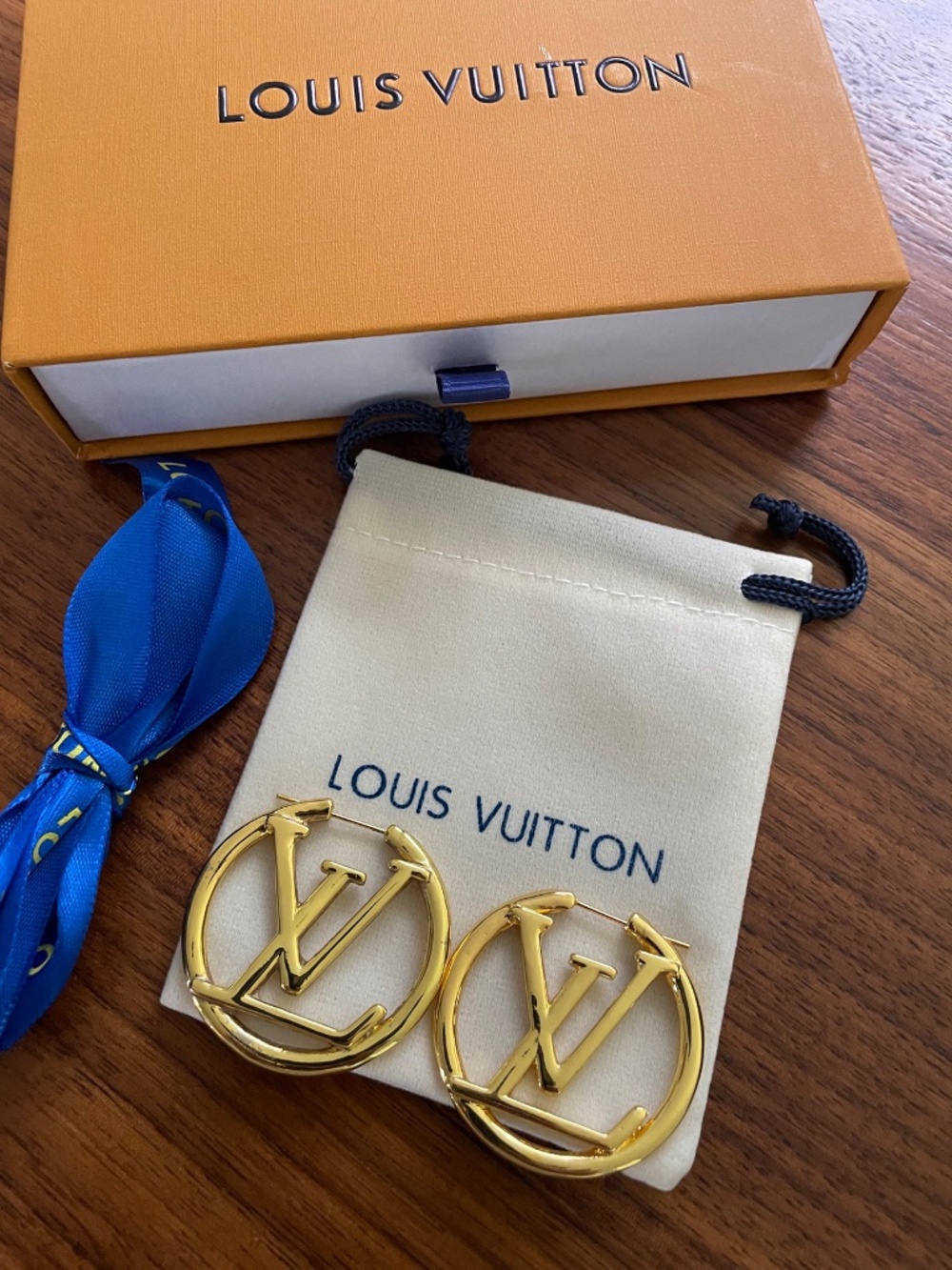 Louis Vuitton LV Logo Gold Tone 1.5” Hoop Earrings